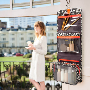 Hanging wash bag in leopard print by Victoria Green