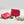detail of make-up bag in red polka dot print
