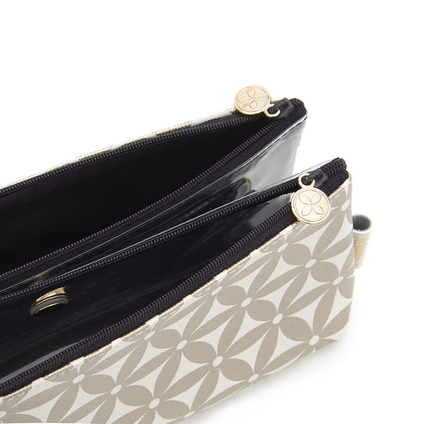 Folding makeup bag with compartments and magnetic fastening in gold