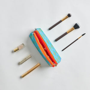 Shell print make up bag with compartments and orange zip