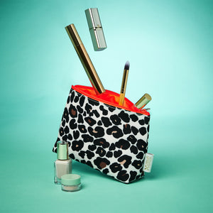 small makeup bag leopard print tan with cosmetics