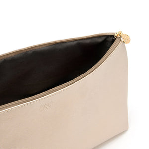 large makeup bag in gold inside