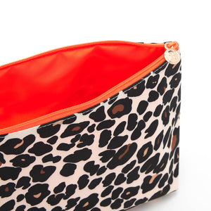 large make up bag interior in leopard tan print and orange lining