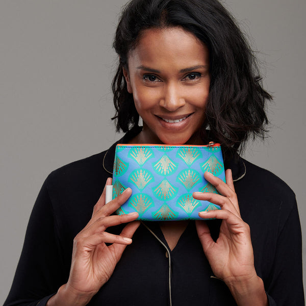 small makeup bag in metallic gold shell print