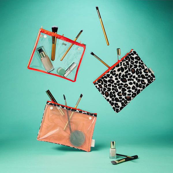 Travel makeup bag including clear makeup bag with makeup up tan leopard print