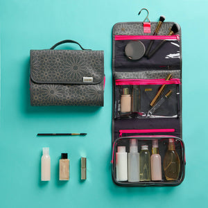hanging wash bag with detachable compartments in charcoal mandala print with toiletries